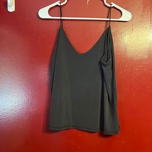 Maurice’s black tank top